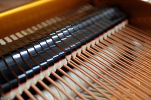 Étouffoirs d'un piano à queue